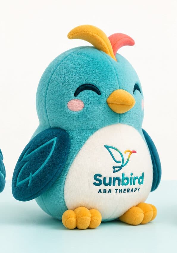 Sunbird's plush mascot — a smiling teal bird with the Sunbird logo on its belly